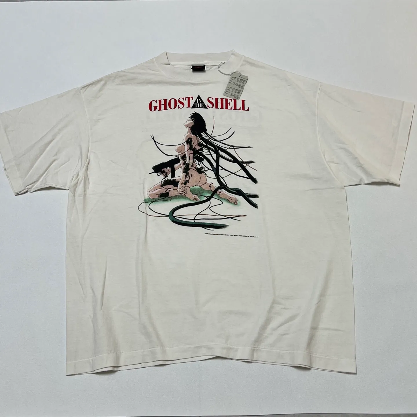 SAINT Mxxxxxx x GHOST IN THE SHELL ' GITS ' SS TEE/WHT Classic Big IP Ghost in the Shell co-branded Suzi Charge/Suzi Character TEE Off-white S-XL Cylindrical side seamless fabric 220g high gram weight OE yarn ⚠️Note: It is almost meaningless if it is not a cylindrical fabric Customized joint main mark/joint wash mark/little angel anti-counterfeiting label Original factory level printing factory Top purchasing agent level